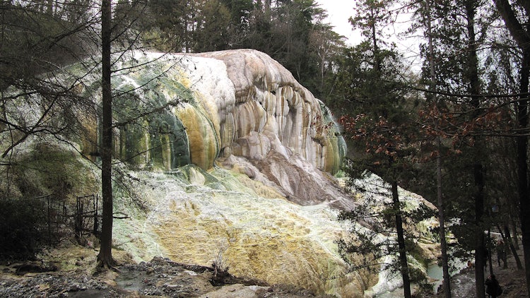 locals and tourists alike have created new pools directly below the waterfall by massing together stones branches and leaves the deposits quickly cement